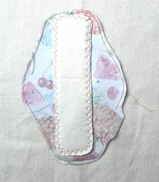 How to sew comfortable sanitary pad Trimming seam allowance.
