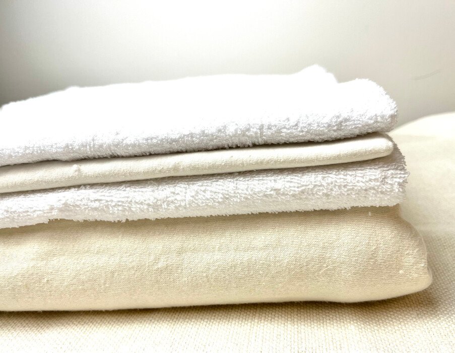 The most reliable absorbent materials for reusable pads Stack of absorbent fabrics