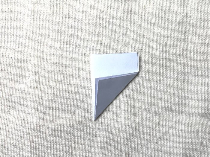 Paper folder in triangle