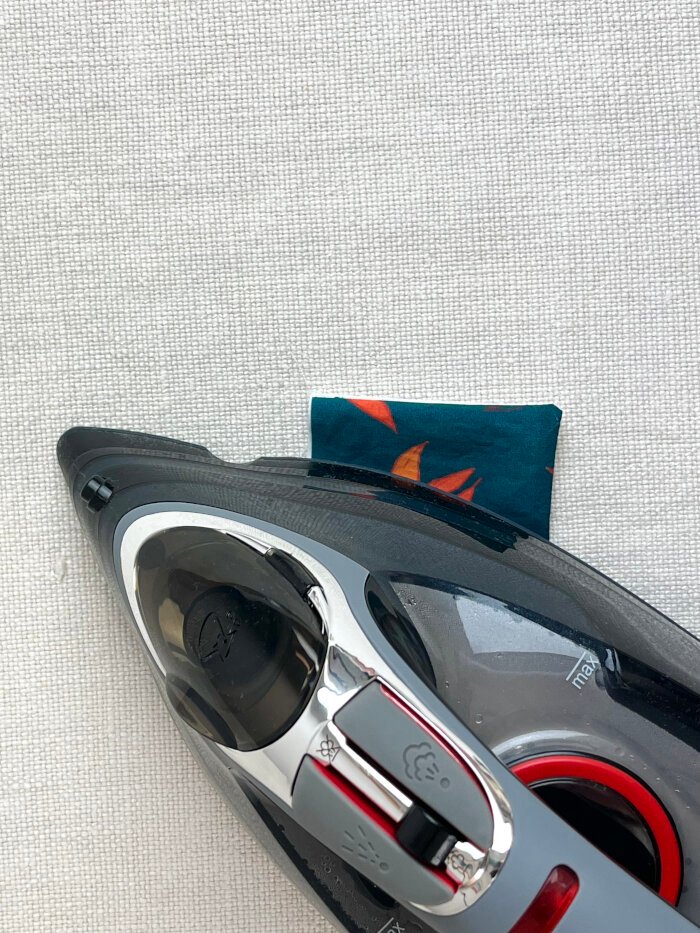 Pressing the pocket pieces to create crisp edges. 