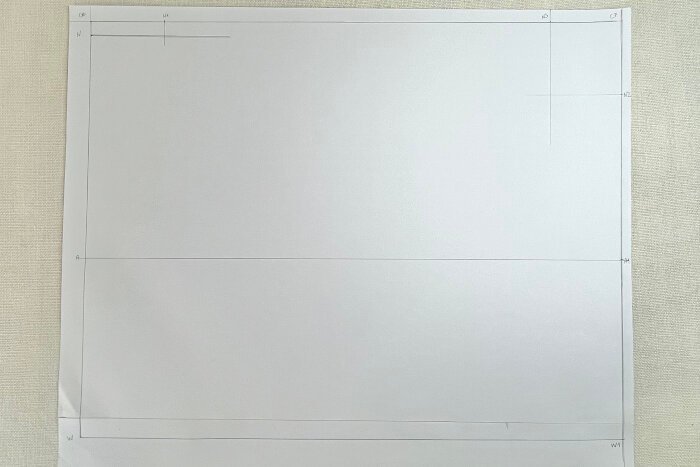 Drawing the first guidelines for a custom bodice block using body measurements.