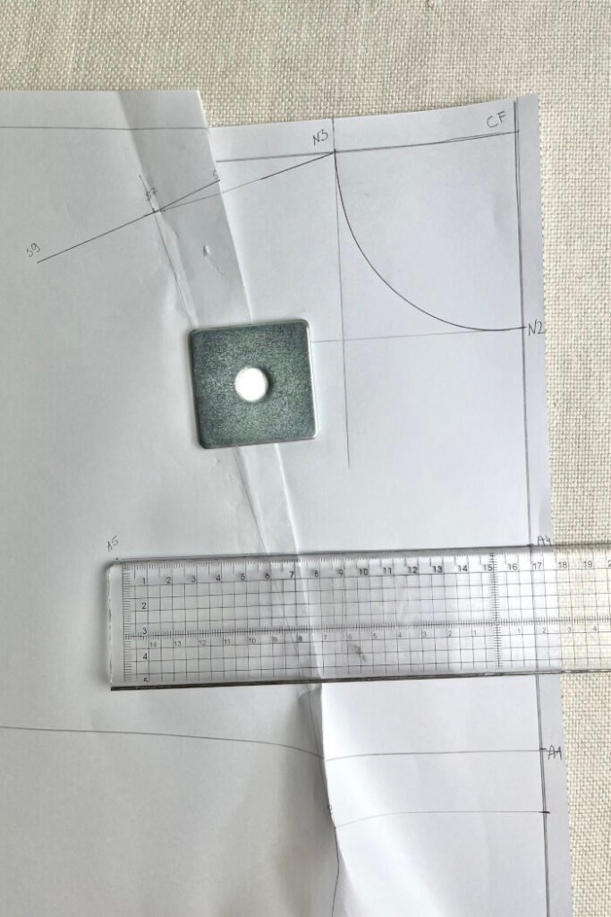 Marking the armhole points on the front bodice block.