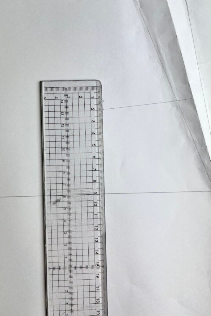 Marking the armhole points on the front bodice block.