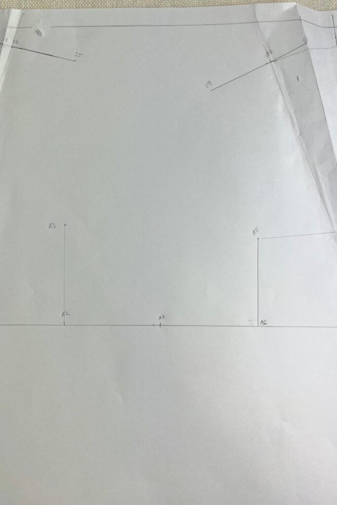 Marking the armhole points on the front bodice block.