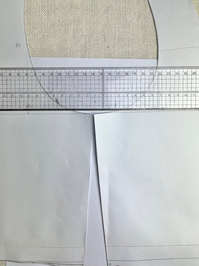 Redrawing the front waist dart to adjust bust ease and create a balanced fit across the bodice block.