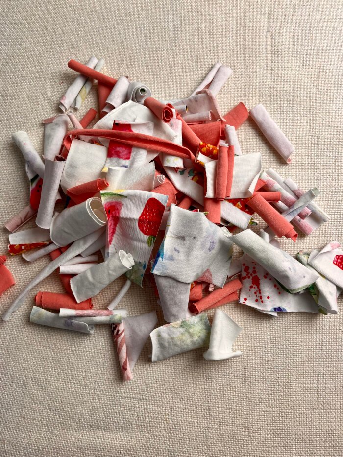 Patchwork fabric scrap cut prepared for a heart shaped coaster