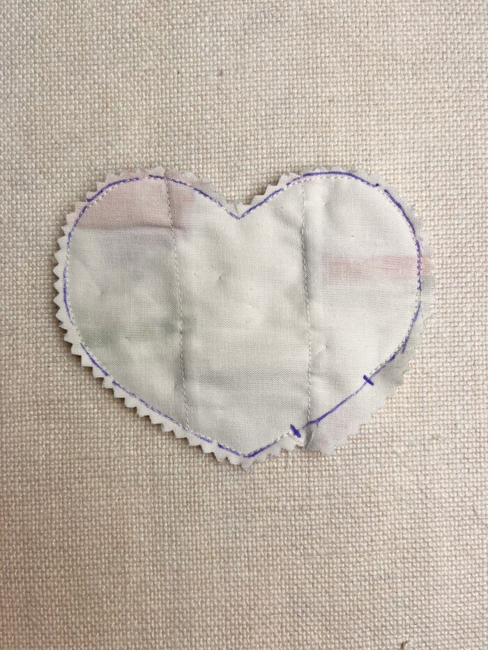 Turning and pressing the finished heart shaped coaster