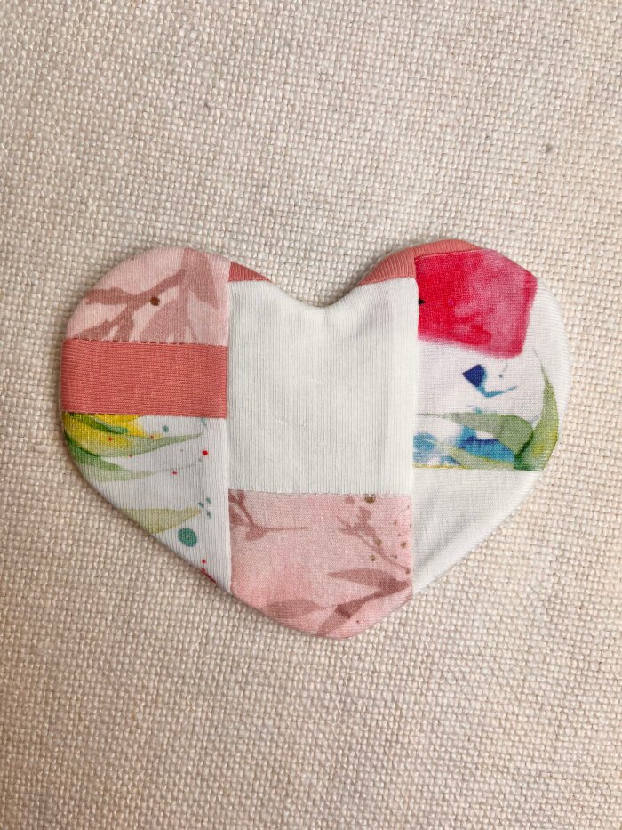 Turning and pressing the finished heart shaped coaster