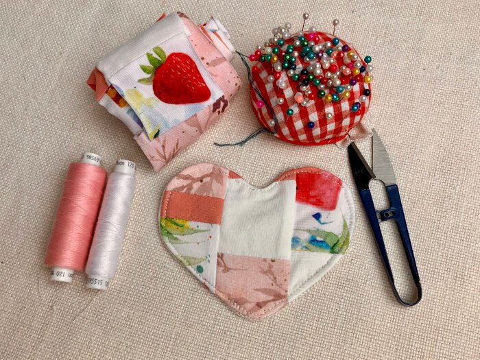 Set of handmade heart shaped fabric coasters made from fabric offcuts