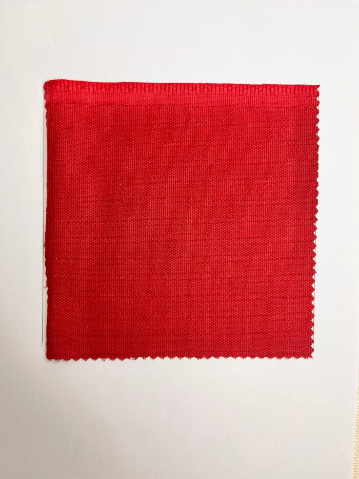 Cotton fabric being prewashed to prevent shrinkage before sewing (Before)