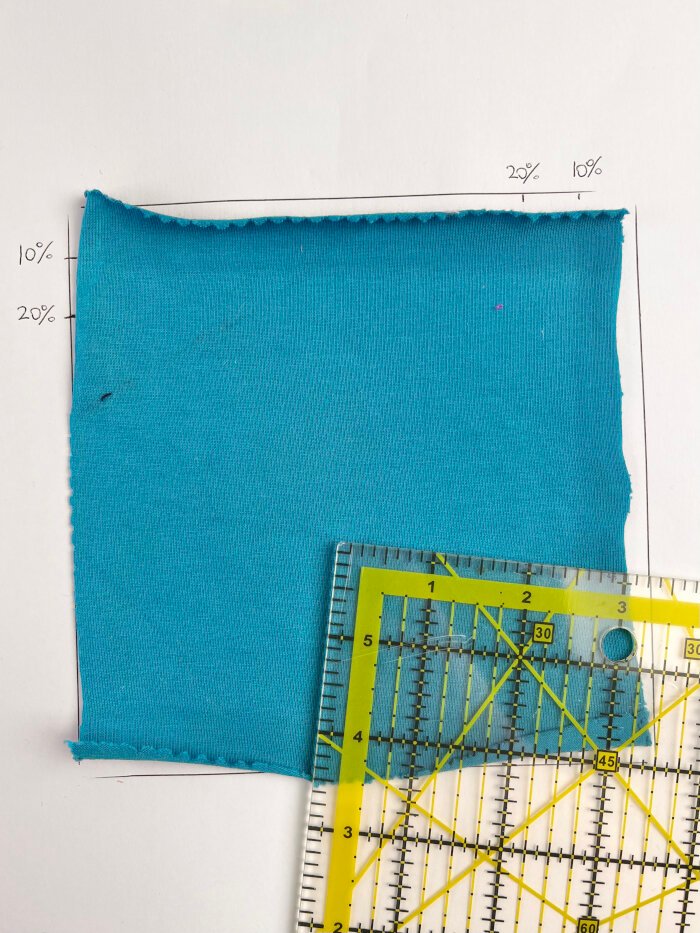 Cotton jersey fabric with rolled edges after washing