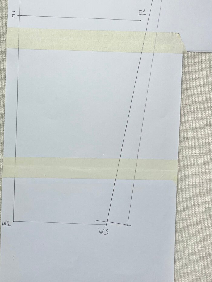 Squaring wrist line on t-shirt sleeve pattern for clean hem finish