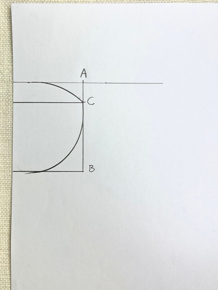 Drafting front neckline curve on baby drool bib pattern using paper fold line