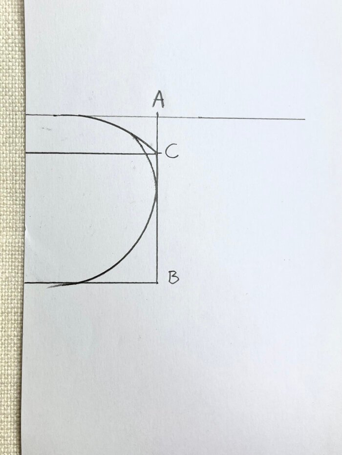 Smoothing neckline transition point to create a rounded baby drool bib neckline