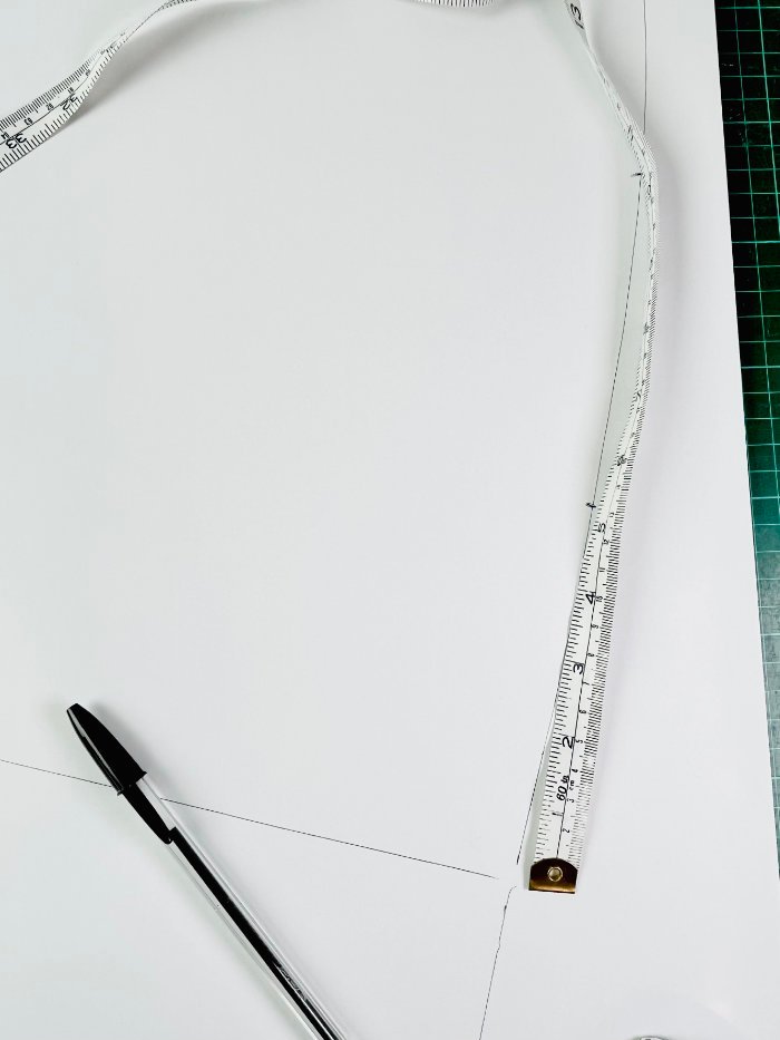 How to Draft a Wrap Skirt Sewing Pattern from an A-Line Block (Beginner Pattern Drafting Tutorial) Measuring two-thirds overlap width at hem for wrap skirt drafting