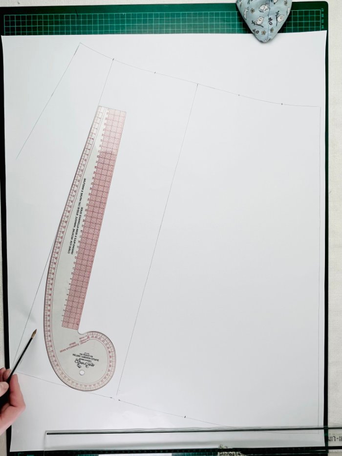 How to Draft a Wrap Skirt Sewing Pattern from an A-Line Block (Beginner Pattern Drafting Tutorial) Curving wrap skirt overlap edge at hem for balanced drape