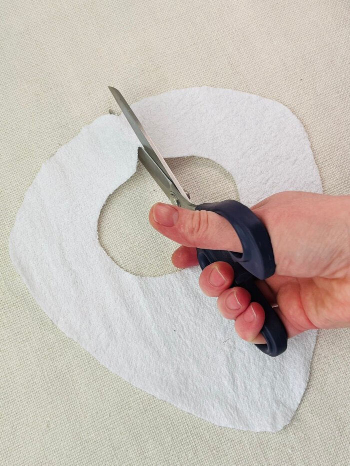 How to Sew a Baby Drool Bib (Easy Step-by-Step Sewing Tutorial) Cutting the handmade baby bib back neck opening along the fold line