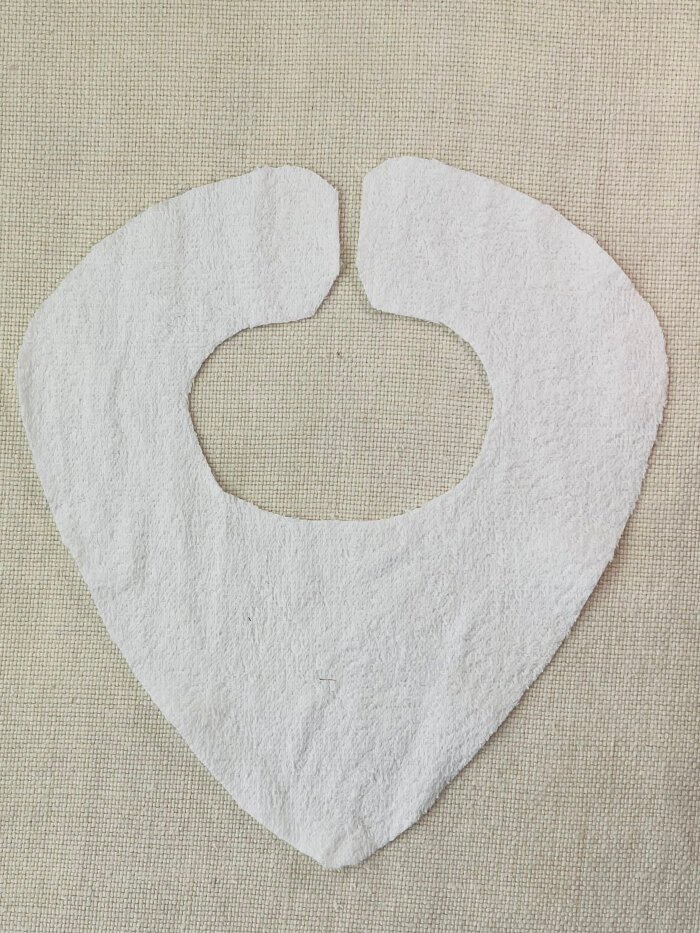 How to Sew a Baby Drool Bib (Easy Step-by-Step Sewing Tutorial) Cutting the handmade baby bib back neck opening along the fold line