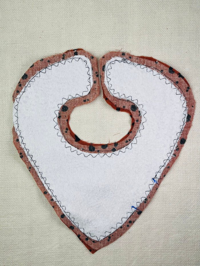 How to Sew a Baby Drool Bib (Easy Step-by-Step Sewing Tutorial) Sewn edges of a baby drool bib with a turning gap marked