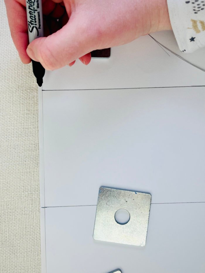 Tracing sleeve pattern and marking the armpit, bicep and elbow lines