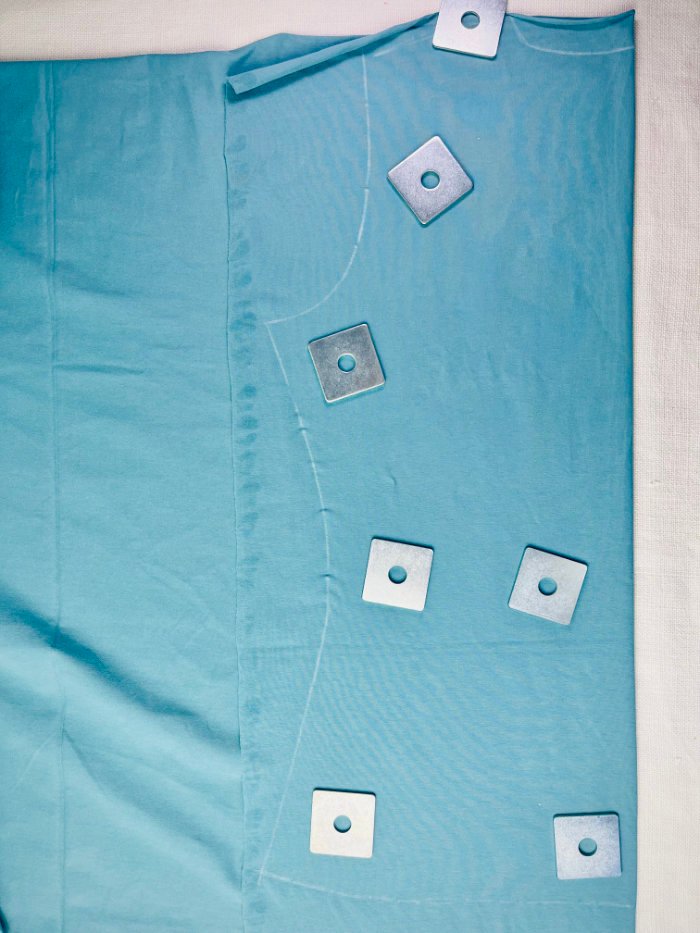 Tracing a fitted T-shirt bodice on fold from cotton jersey fabric