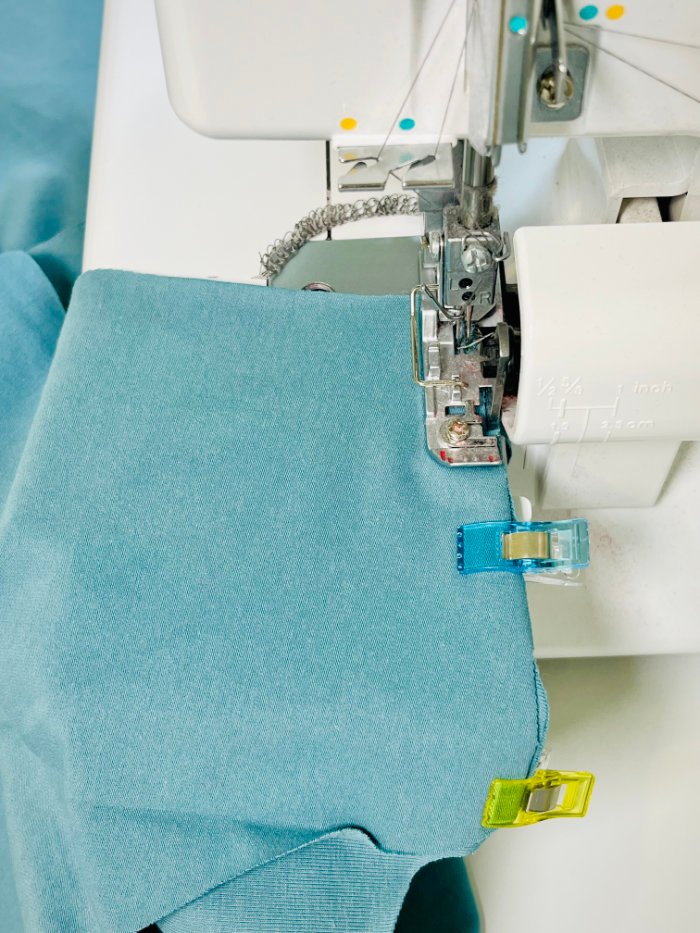 Sewing shoulder seams on a women’s fitted T-shirt using jersey fabric