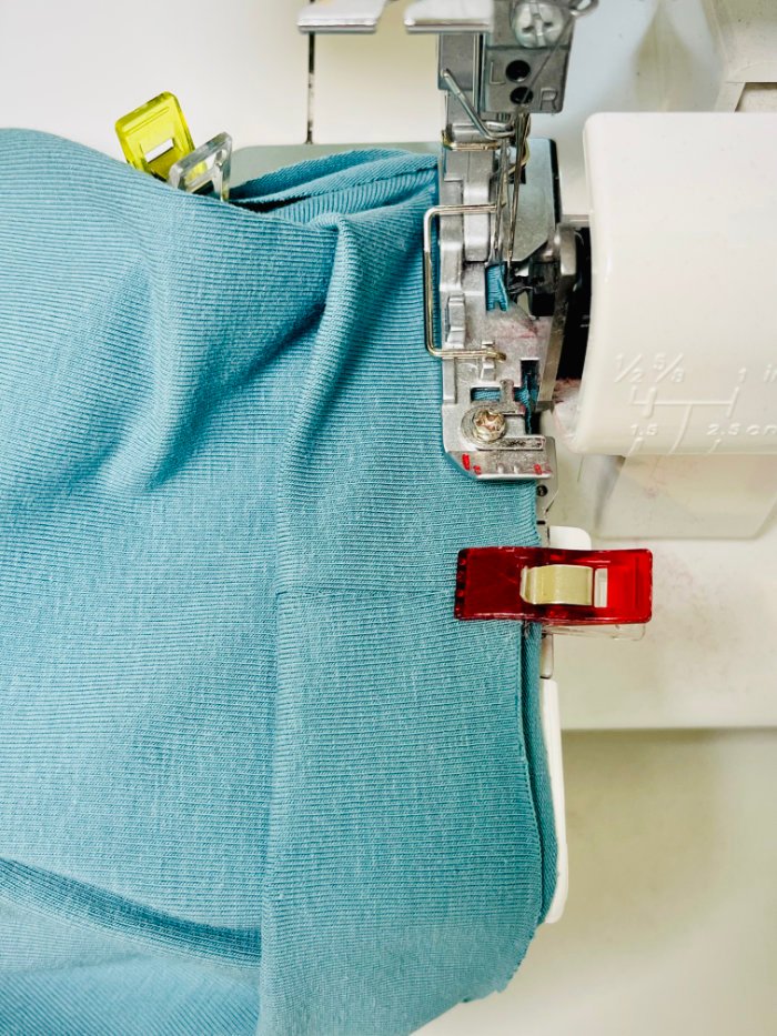 Attaching a knit neckband to a fitted T-shirt neckline