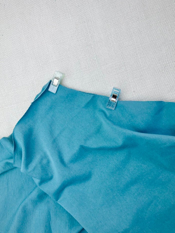 Pinning the DIY T-shirt sleeve to the armhole at the side seams