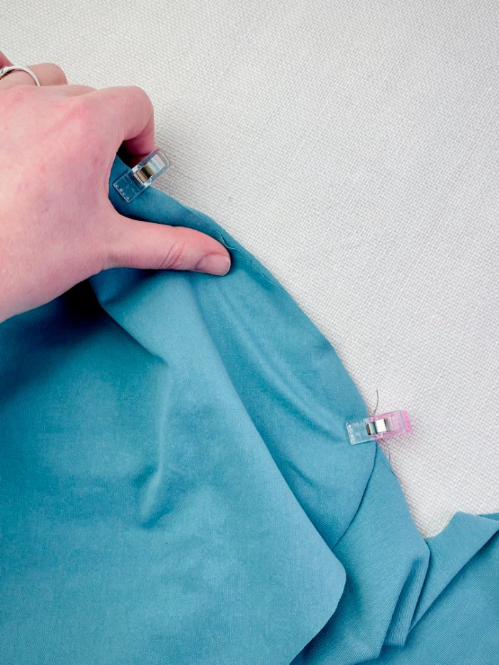 Pinning the knit T-shirt sleeve crown to the bodice