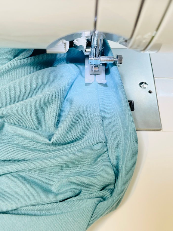 Topstitching a T-shirt neckband for a clean professional finish