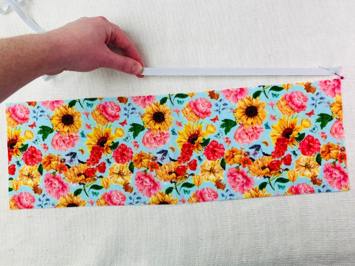 How to Sew a Hair Scrunchie: 4 Easy Methods Using Less Fabric (Beginner-Friendly) Cutting soft elastic to size for sewing a comfortable hair scrunchie