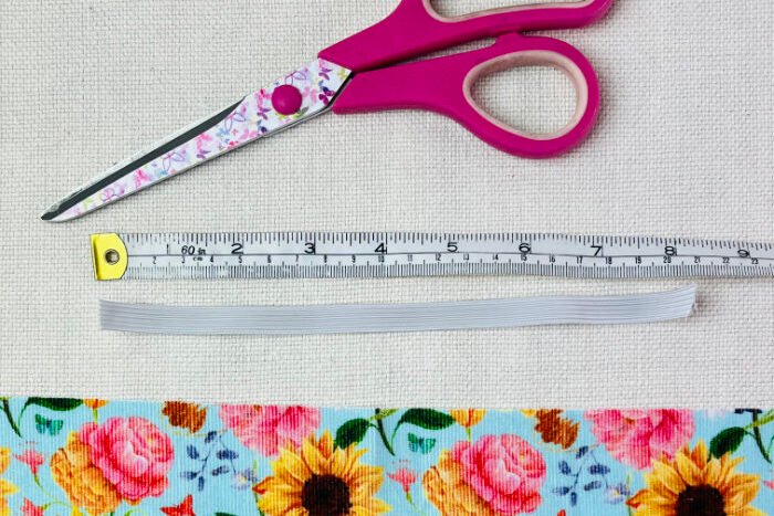 How to Sew a Hair Scrunchie: 4 Easy Methods Using Less Fabric (Beginner-Friendly) Cutting soft elastic to size for sewing a comfortable hair scrunchie