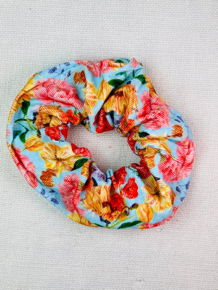 How to Sew a Hair Scrunchie: 4 Easy Methods Using Less Fabric (Beginner-Friendly) Turning burrito method hair scrunchie right side out through opening