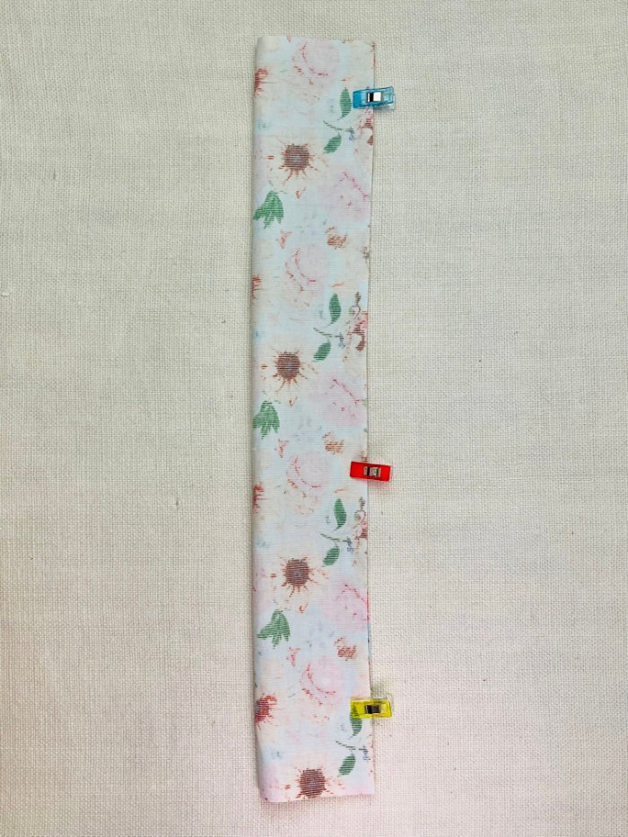 How to Sew a Hair Scrunchie: 4 Easy Methods Using Less Fabric (Beginner-Friendly) Pinning long fabric edges right sides together to sew a hair scrunchie tube