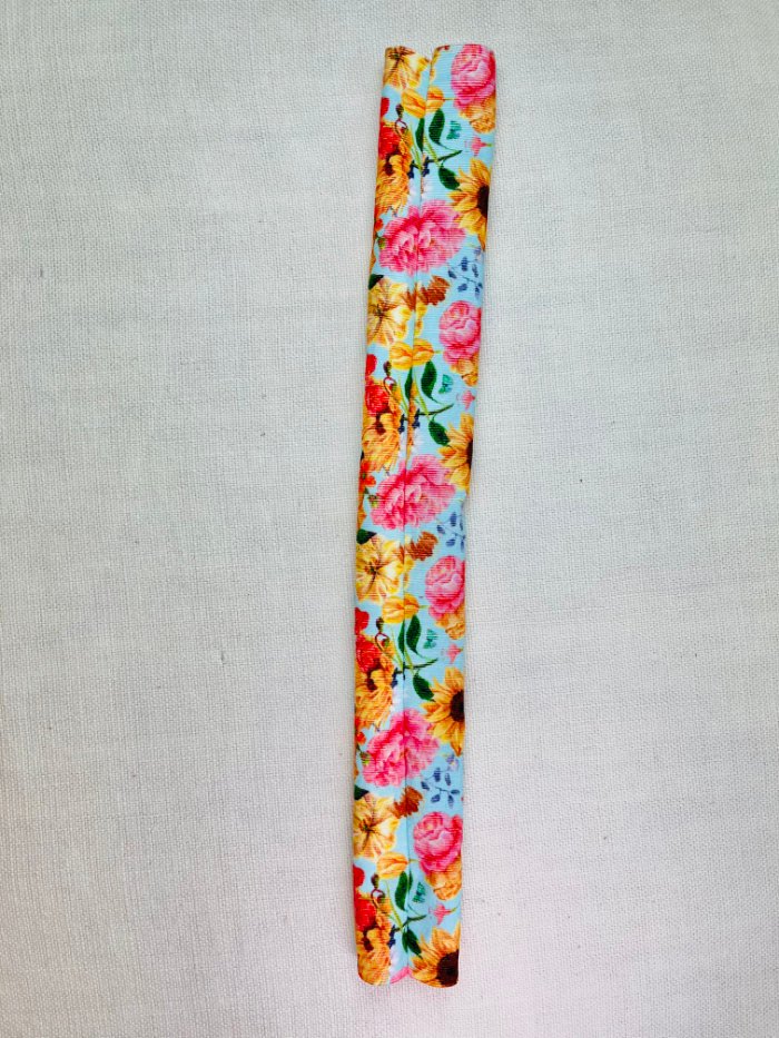 How to Sew a Hair Scrunchie: 4 Easy Methods Using Less Fabric (Beginner-Friendly) Turning fabric tube right side out when sewing a hair scrunchie