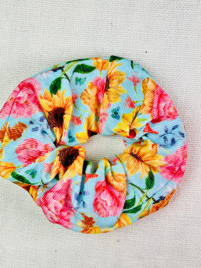 How to Sew a Hair Scrunchie: 4 Easy Methods Using Less Fabric (Beginner-Friendly) Folding raw fabric edge inside to close hair scrunchie seam neatly