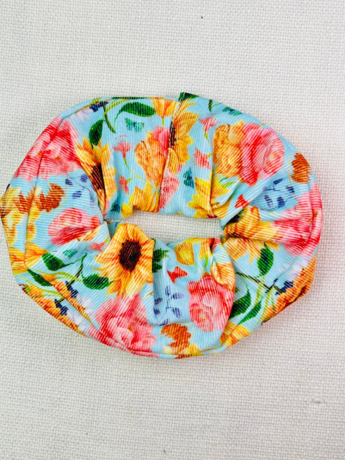 How to Sew a Hair Scrunchie: 4 Easy Methods Using Less Fabric (Beginner-Friendly) Topstitching overlapping fabric ends to finish sewing a hair scrunchie