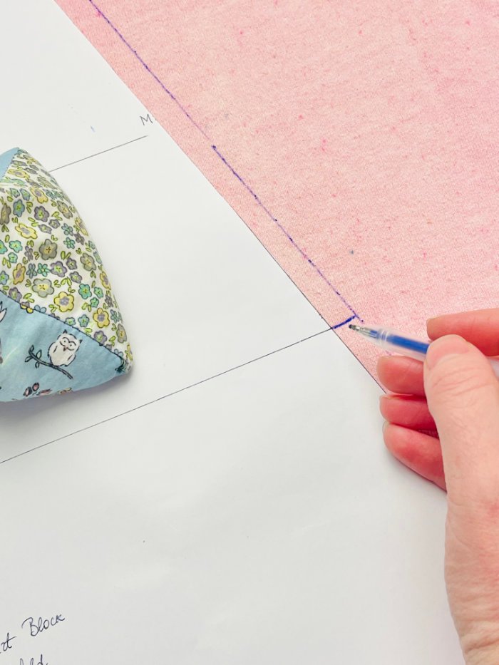 How to Sew a Wrap Skirt from an A-Line Skirt Block (Beginner) Marking hip line notches on front and back wrap skirt fabric pieces before sewing