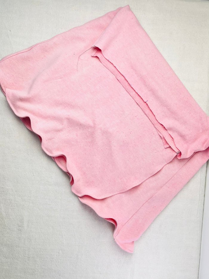 How to Sew a Wrap Skirt from an A-Line Skirt Block (Beginner) Completed rolled hem on wrap skirt edge showing clean finish on both sides