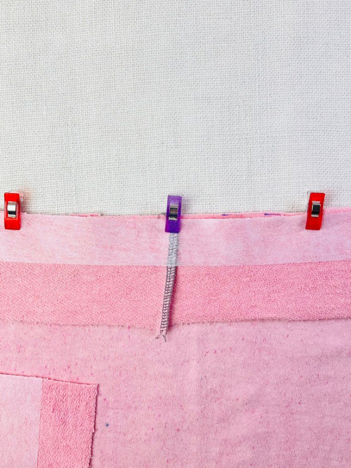 How to Sew a Wrap Skirt from an A-Line Skirt Block (Beginner) Pinning extended waistband to wrap skirt waistline with right sides together