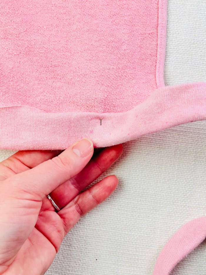 How to Sew a Wrap Skirt from an A-Line Skirt Block (Beginner) Pinned waistband from the wrong side, showing the raw edge captured by pin