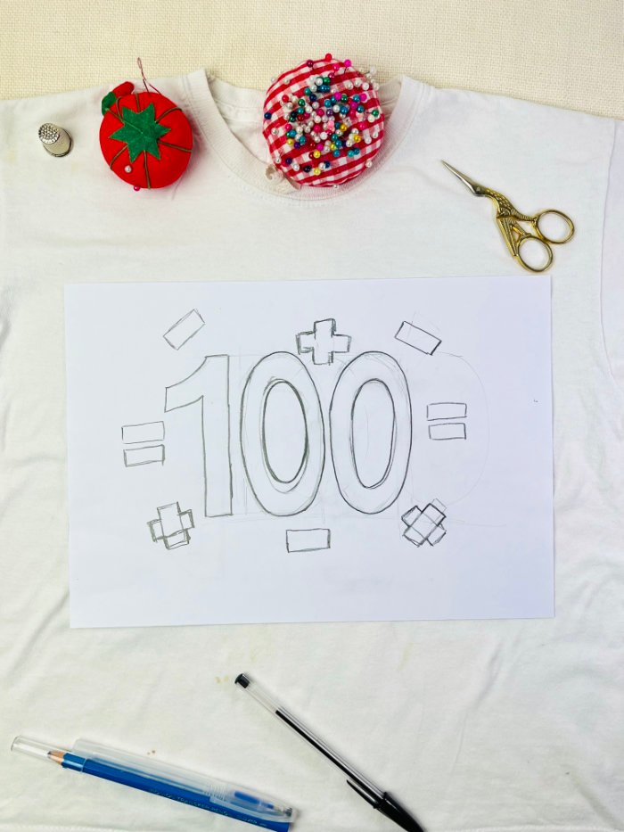 Hand-drawn number design for reverse appliqué sketched on paper at full size