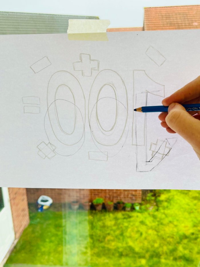 Tracing the reverse appliqué design with a heat transfer pencil