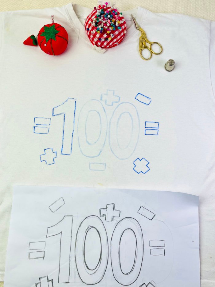 Reverse appliqué number transferred onto T-shirt using a heat transfer pencil and iron