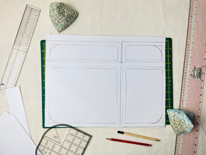 Drafted back pocket pattern pieces for phone and sandwich pockets on laptop bag