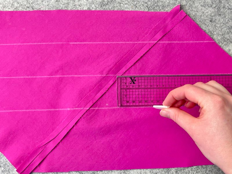 How to Make Bias Binding (Step-by-Step Tutorial for Beginners) Drawing evenly spaced parallel lines for continuous bias binding before forming tube.