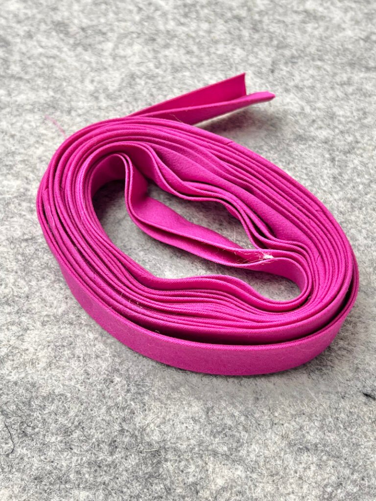 How to Make Bias Binding (Step-by-Step Tutorial for Beginners) Finished handmade double fold bias binding ready to use on sewing project.