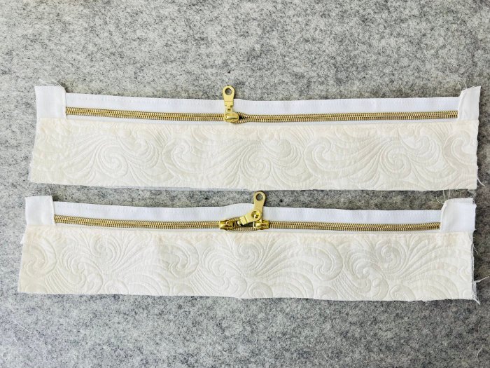 Sewing zippers onto exterior laptop bag panels