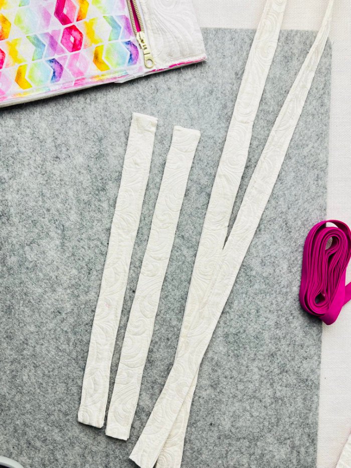 Topstitching handmade fabric strap for structured laptop bag