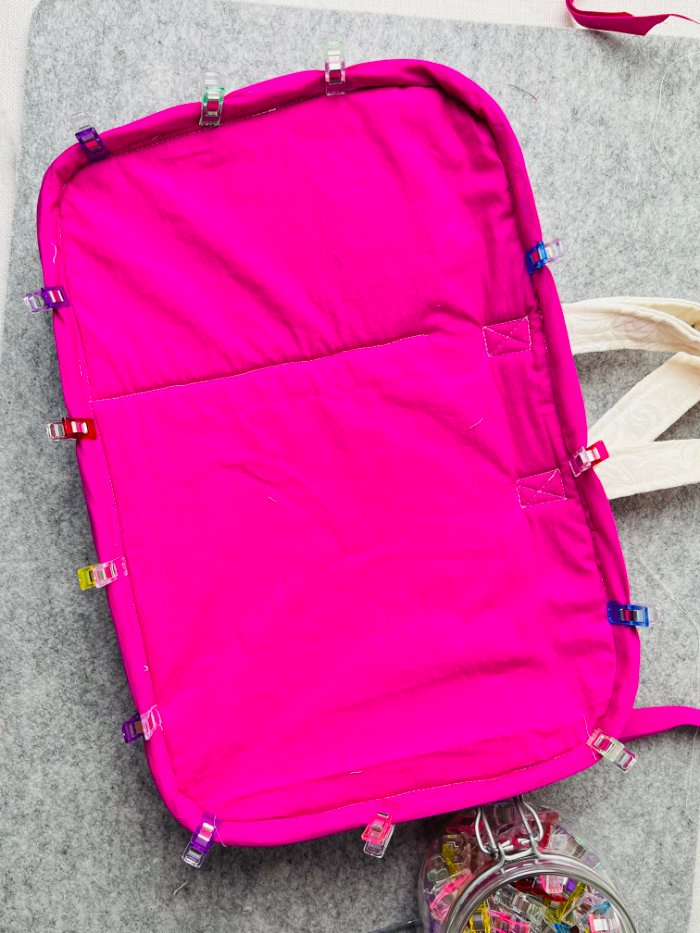 Pinning bias binding to encase seam allowance